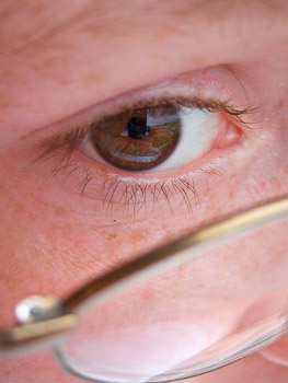 This photo of a gentleman and his glasses ... obviously he's a "vision care" consumer ... was taken by an unknown photographer.